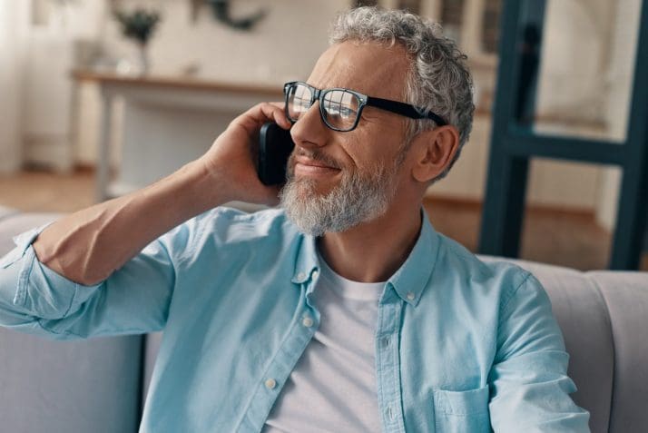 Senior man on the phone discussing his Social Security benefits